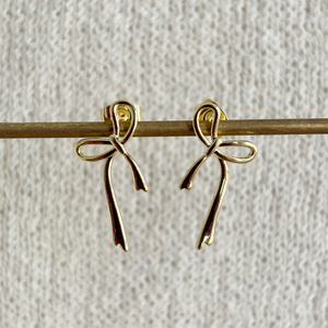 GOLDEN BOW EAR STUDS